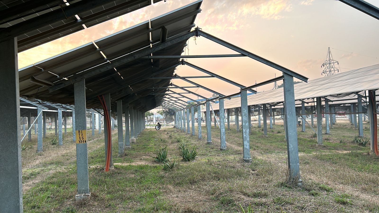 View beneath completed module rows at dusk
