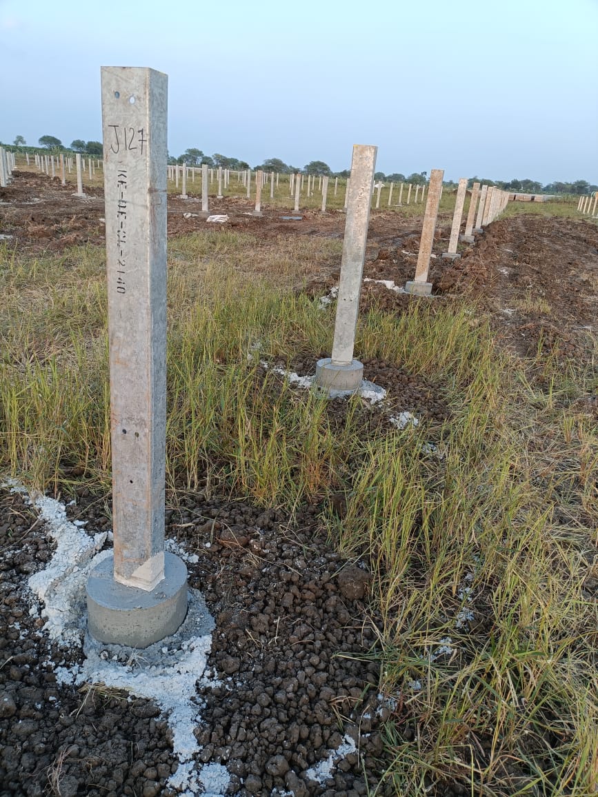 Close view of a precast concrete post grouted at its base