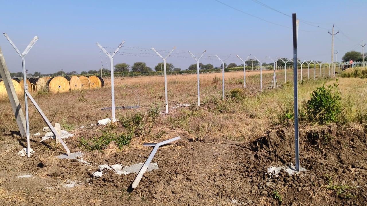 Galvanised module mounting structure posts set out across a field