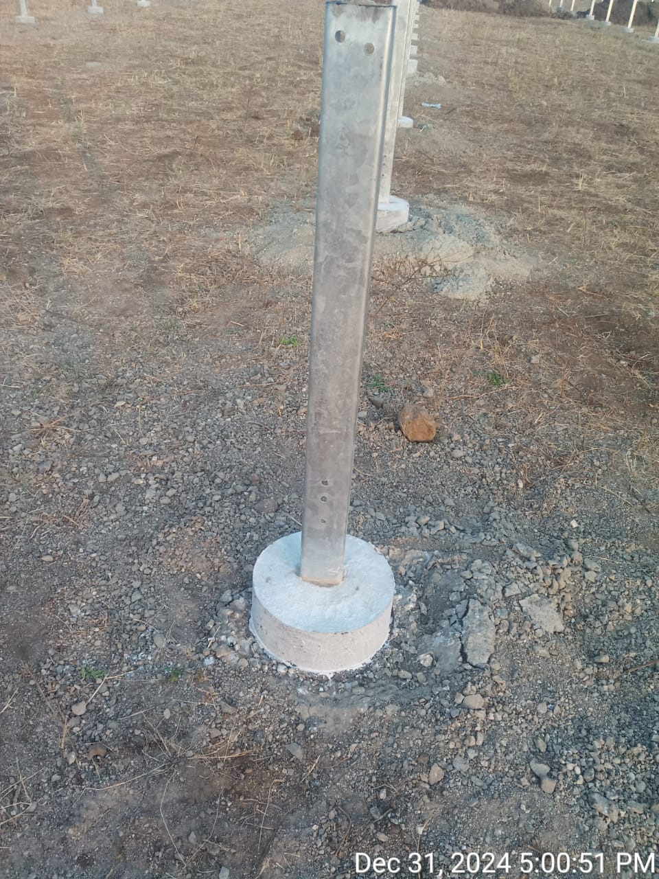 Galvanised structure post grouted into a cast concrete pile cap