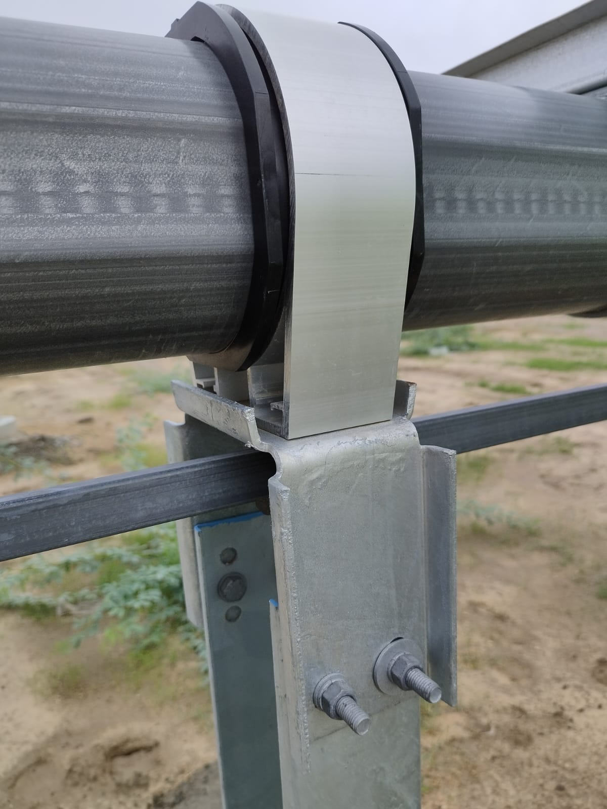 Torque tube seated in its bearing clamp on the support post