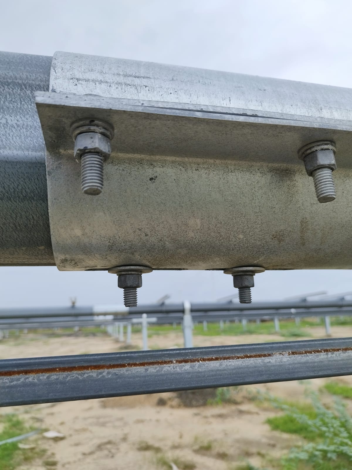 Bolted splice plate joining two lengths of tracker torque tube